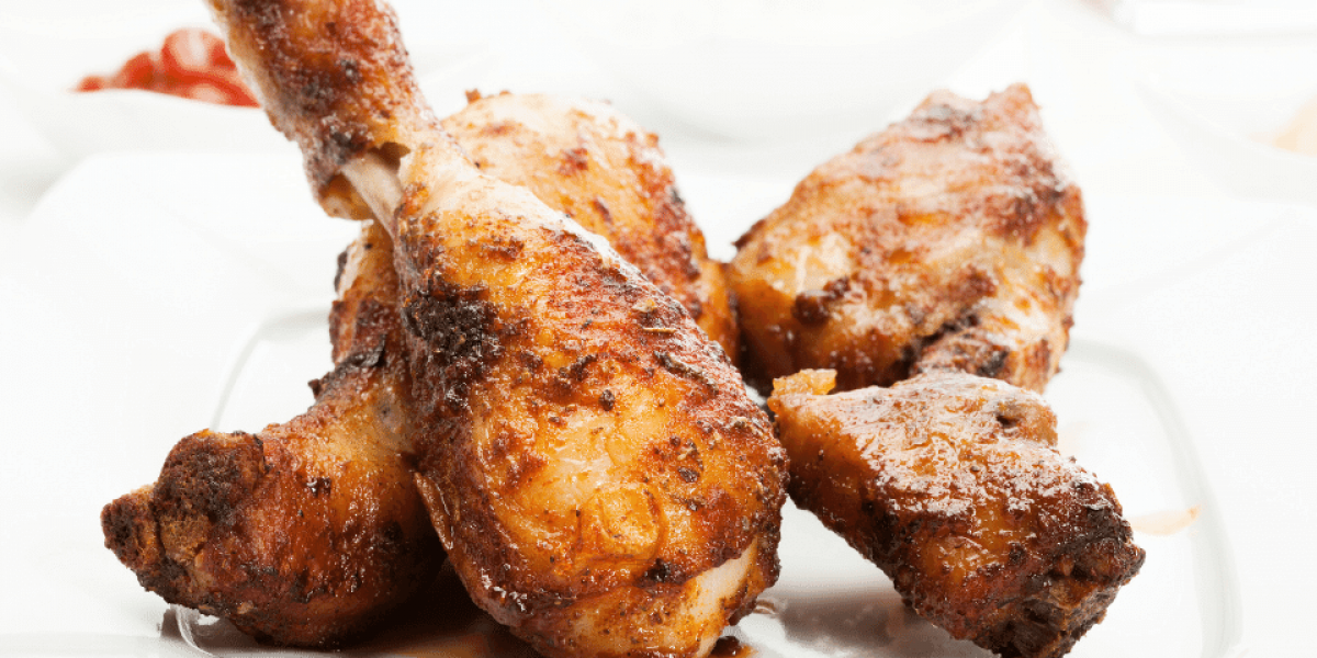 Apple Honey Chicken Drumsticks on white plate