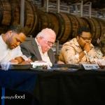 Judging panel scoring chefs' dishes